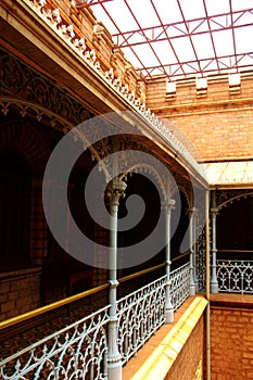The beautiful halls with ornamental steel fence in the palace of bangalore. photo