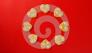 beautiful hand-baked cookies in the shape of a heart on a red background