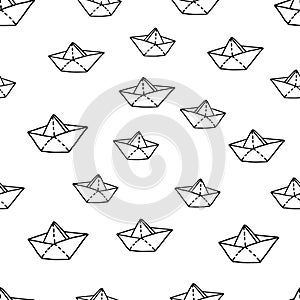 Beautiful hand-drawn black vector illustration of group of origami paper toy boats isolated on a white background for coloring