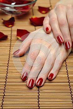 Beautiful hand with nail red manicure