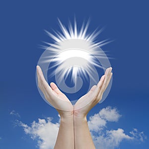 Beautiful hand sun and blue sky