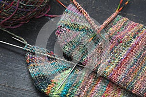 Beautiful handknit knitting samples of socks, made with pure handspun sheep wool yarn from a traditional spinning wheel