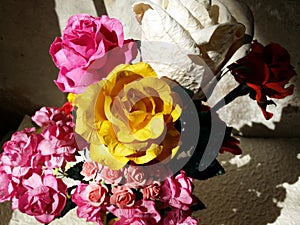 beautiful handmade mulberry paper roses bouquet in vase in warm light studio