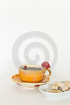 Beautiful handmade orange cup with red rose