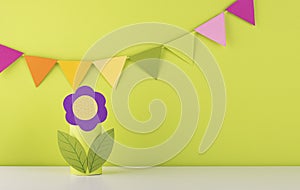 Beautiful handmade paper flower on green background