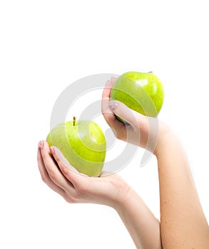 In beautiful hands a two green apple , Isolated on white background