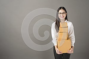 Beautiful happiness  woman with box portrait  in studio