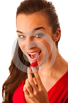 Beautiful happy asian caucasian woman in red t shirt eating stra