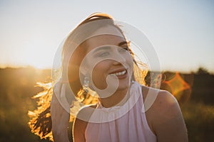 Beautiful happy brunette women in summers dress