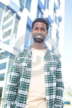 Beautiful happy business man outside in the park