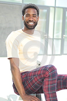 Beautiful happy business man outside in the park