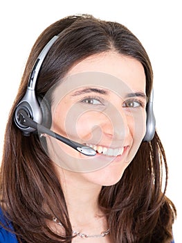 Beautiful happy call center consultant smiling woman with headset phone in white background