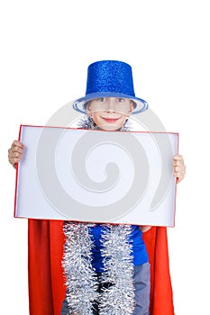 Beautiful happy child wearing blue party hat holds a small rectangular white board