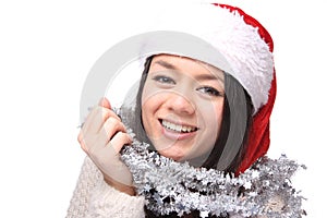 Beautiful happy Christmas woman in front of a white background