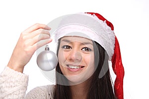 Beautiful happy Christmas woman in front of a white background