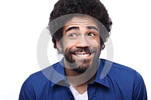 Beautiful happy funky afro man posing in front of a background