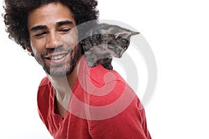 Beautiful happy funky afro man posing in front of a background