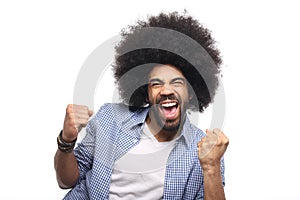 Beautiful happy funky afro man posing in front of a background