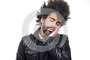 Beautiful happy funky afro man posing in front of a background