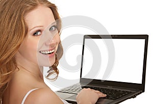 Beautiful happy girl with laptop, blank screen