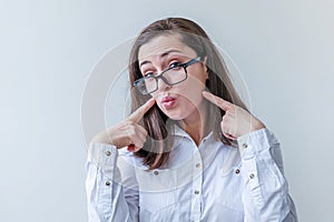 Beautiful happy girl smiling. Beauty simple portrait young smiling brunette woman in eyeglasses isolated on white