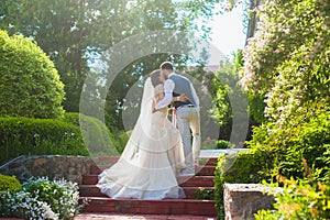 Beautiful happy just married couple kissing