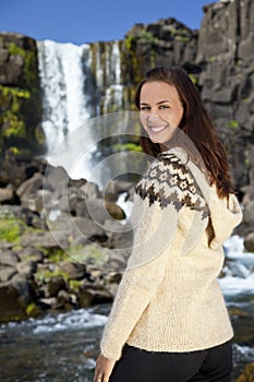 Beautiful Happy Scandinavian Woman By A Waterfall