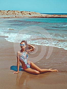 Beautiful happy slender woman at sea