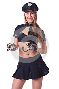 Beautiful happy smiling police girl handcuffs