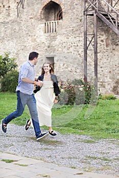 Beautiful happy smiling running couple in love