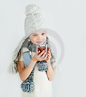 Beautiful Happy Smiling Winter Girl with Tea Mug. Laughing Girl