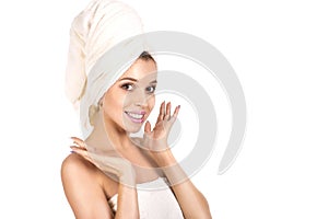 Beautiful Happy Spa Girl Isolated on a White Background. Touching her Face. Happy Woman after Bath with Clean Perfect