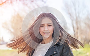 Beautiful happy sunshine girl teenager asian european mixed race with long hair portrait