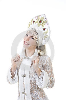 Beautiful, happy woman with long hair, dressed as Santa Claus smiling. Christmas - New Year carnival