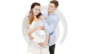 Beautiful Happy Young Couple Expecting Baby isolated photo