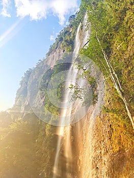 The beautiful Harau Valley Waterfall amazes the eyes, hearts and souls of the enchanting sunny day. photo