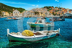 Beautiful harbor with fishing boats and historic buildings, Hvar, Croatia