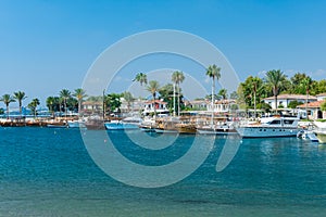 Beautiful harbour with boats in Side resort town at sunset - Antalya, Turkey