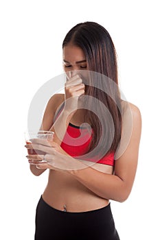 Beautiful healthy Asian girl hate tomato juice.