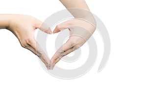 Beautiful and healthy Asian woman hands with neat manicure in a shape of heart