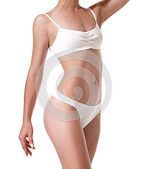 Beautiful healthy fit slim female body on white background