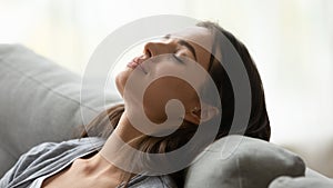 Beautiful healthy young woman taking deep breath of fresh air photo