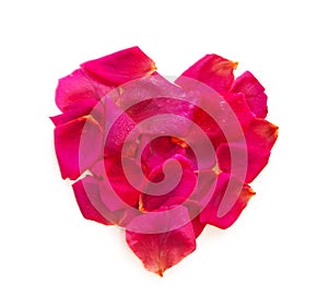 Beautiful heart of pink rose petals .