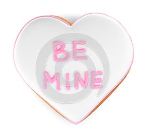 Beautiful heart shaped cookie with phrase Be Mine on white background, top view. Valentine`s day treat