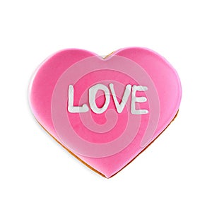 Beautiful heart shaped cookie with word Love on white background, top view. Valentine`s day treat