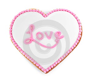 Beautiful heart shaped cookie with word Love on white background, top view. Valentine`s day treat