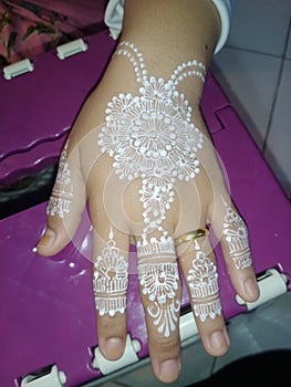 beautiful henna on the hands of the bride