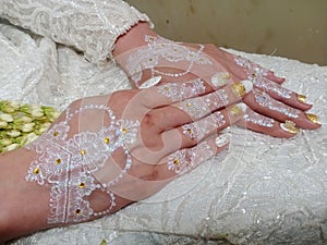 Beautiful henna in the hands of the bride