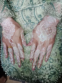 Beautiful henna in the hands of the bride