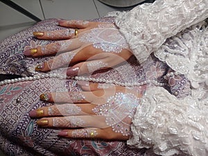 beautiful henna on the hands of the bride